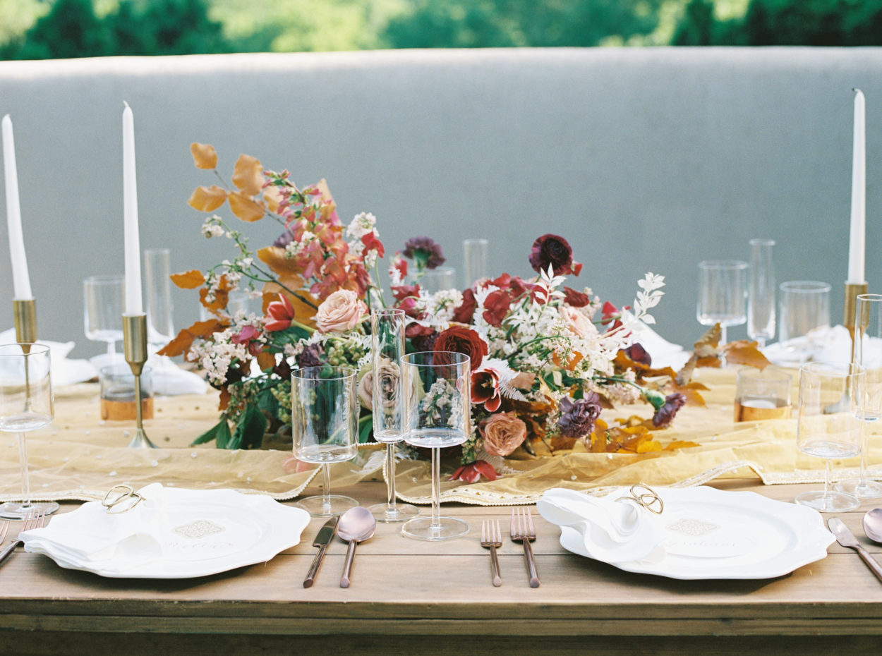 Bold and bright wedding head table centerpiece by Mary Love Richardson of Rosemary & Finch.