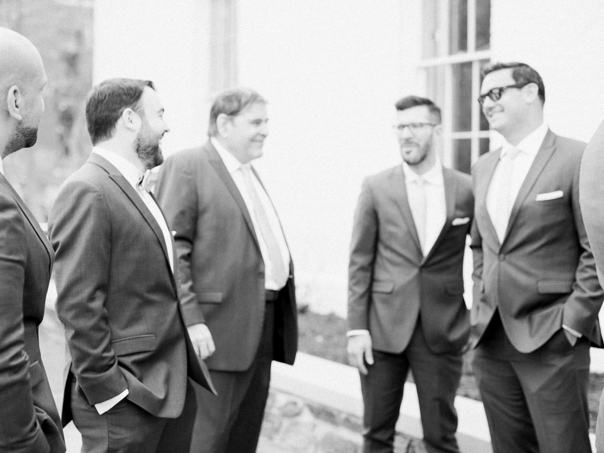 Groomsmen hanging out before wedding ceremony in Georgetown, DC