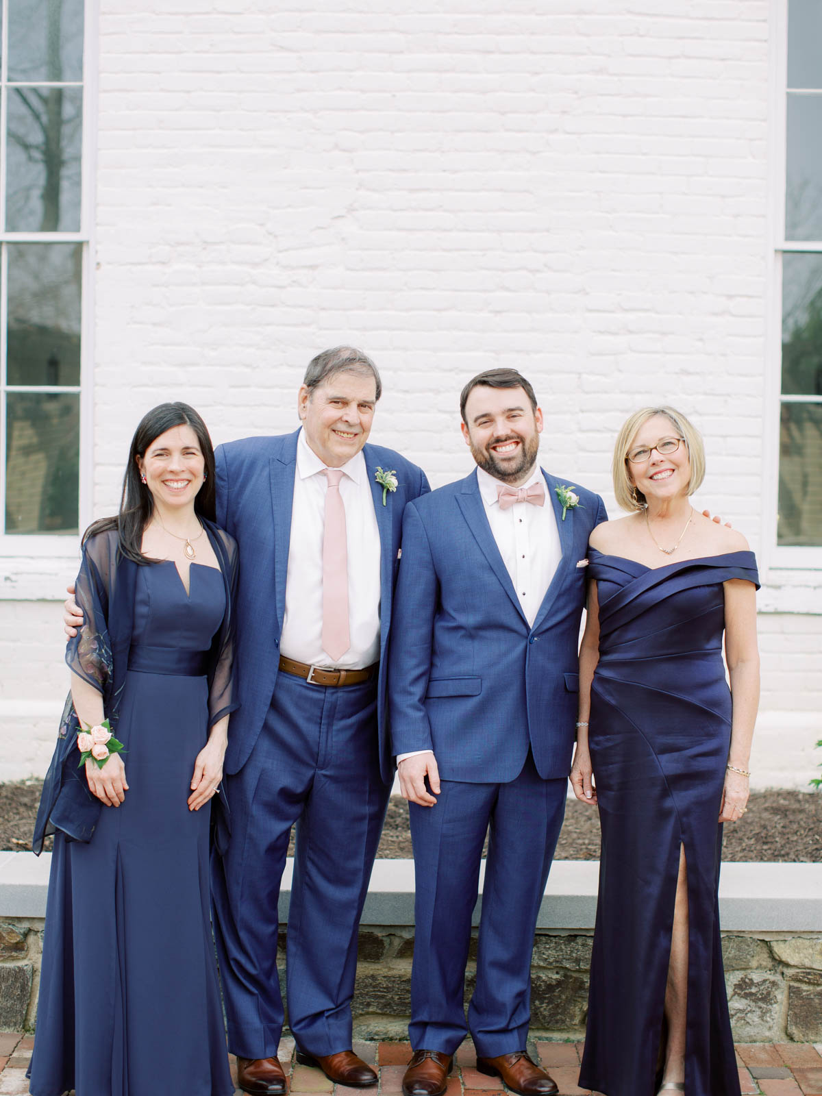 Groom's family dressed in navy blue for wedding ceremony in Georgetown, DC