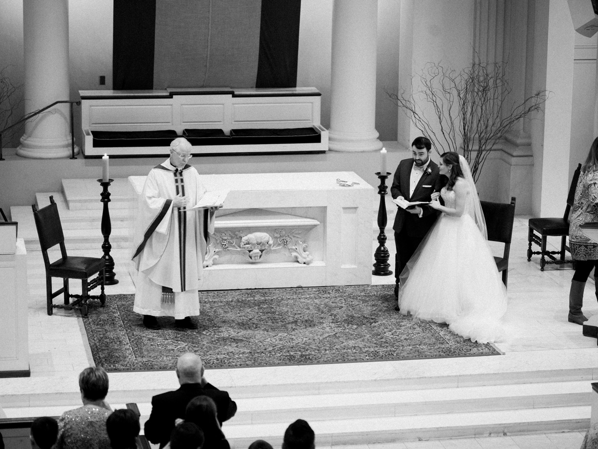 Bride and groom reading during DC wedding ceremony