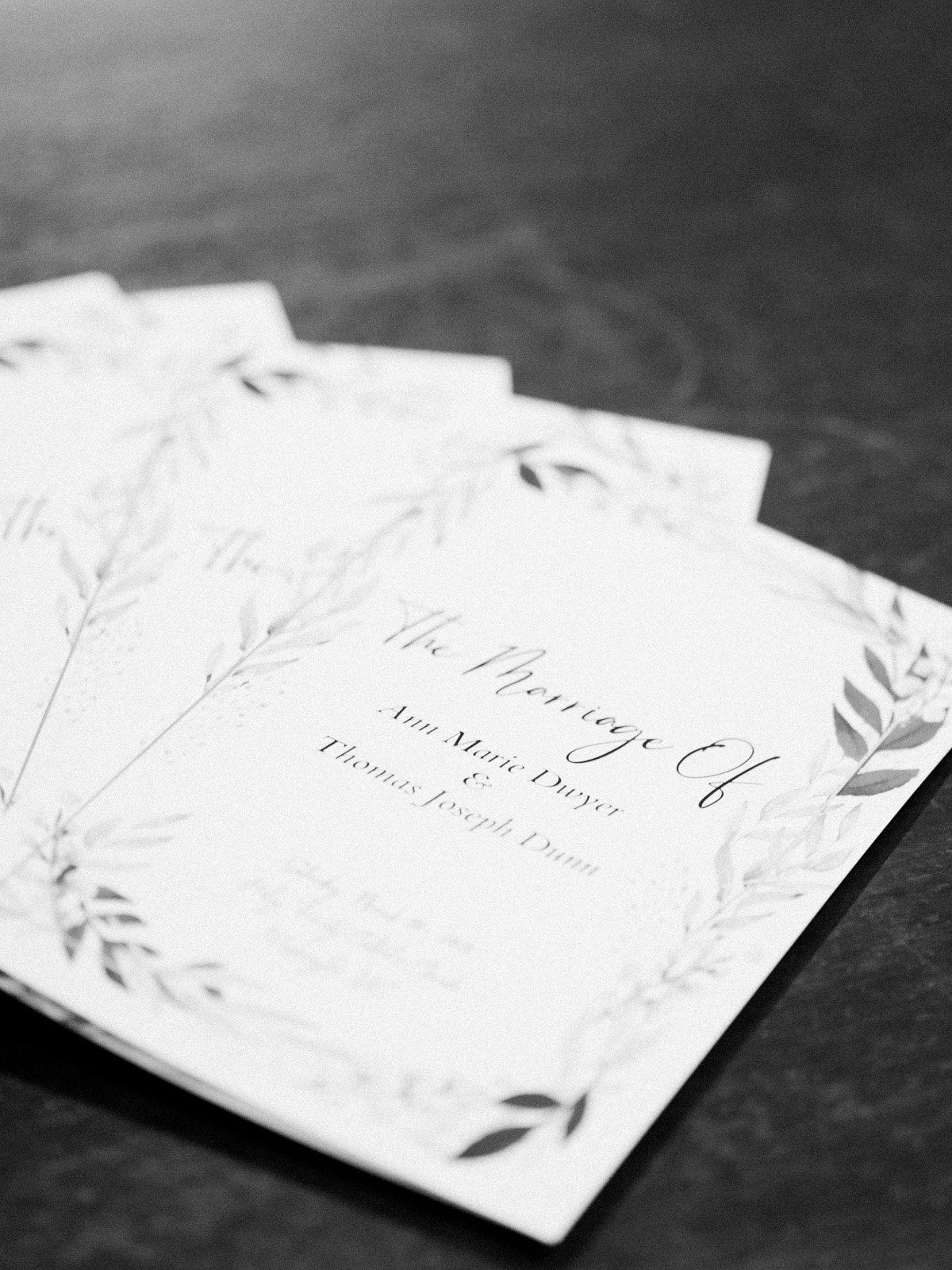 Wedding invitations displayed at ceremony for wedding in Georgetown, DC