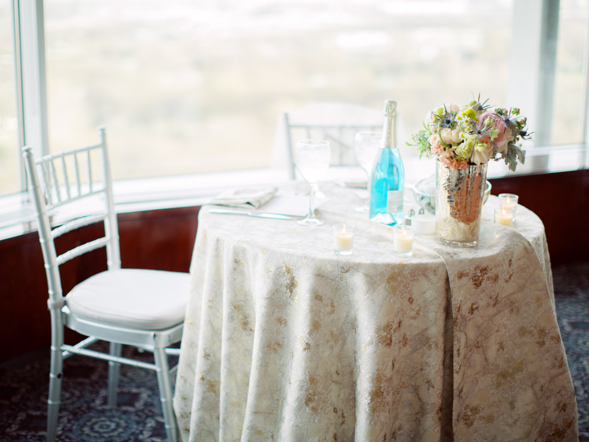 Sweetheart table for bride and groom at Top of the Town wedding in Arlington