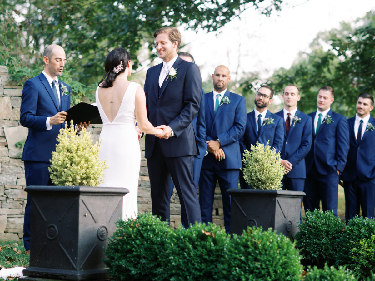 Wedding couple exchanges vows during ceremony at Inn at Fernbrook Farms in Chesterfield, NJ