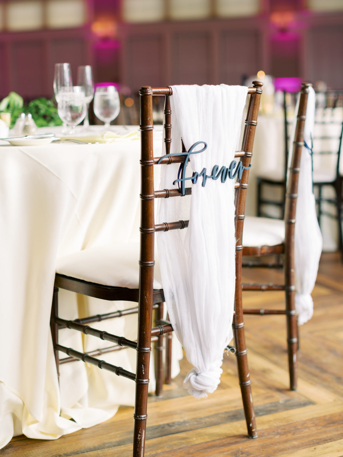 Decorated chevari chairs for the sweetheart table at Chesapeake Bay Beach Club