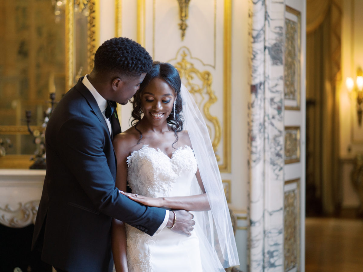 Wedding couple poses for portraits at Anderson House in Washington, D.C.