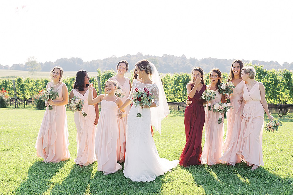 Vibrant pink summer Stone Tower Winery wedding reception in Leesburg.