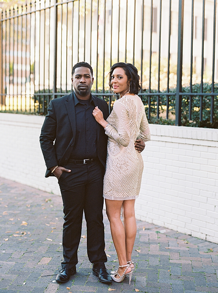Chic downtown Jackson engagement featuring a red roses winter bouquet.