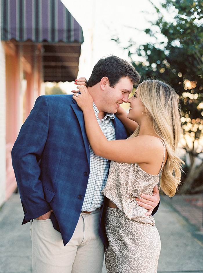 Warm sunset engagement session in downtown Raymond, Mississippi.